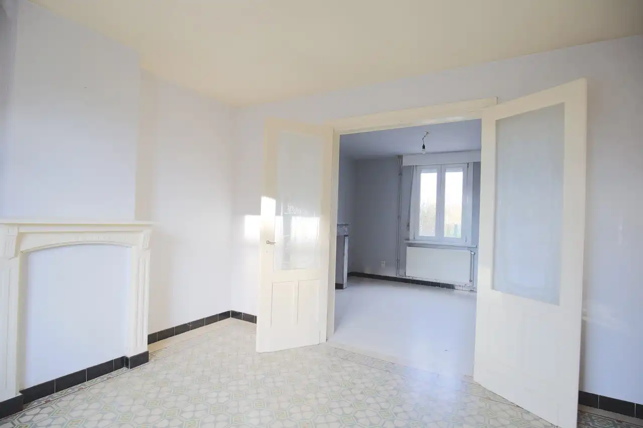 Rijwoning met terras en tuin foto 4