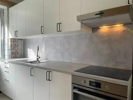 Gelijkvloers 2-slaapkamer appartement met terras en garage foto {{pictureIndex}}