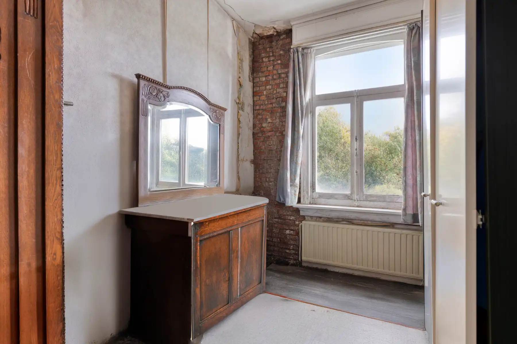 Te renoveren woning met ruime tuin. foto 9