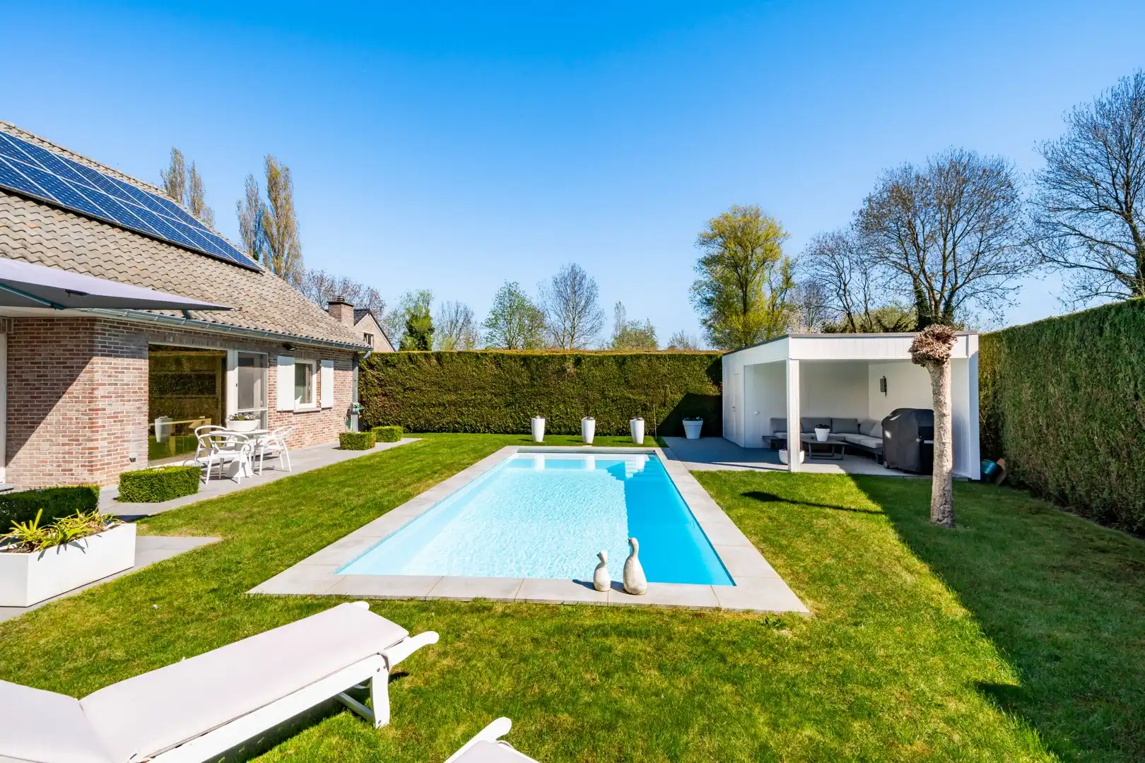 Charmante woning met 4 slaapkamers en verzorgde tuin met zwembad foto 18