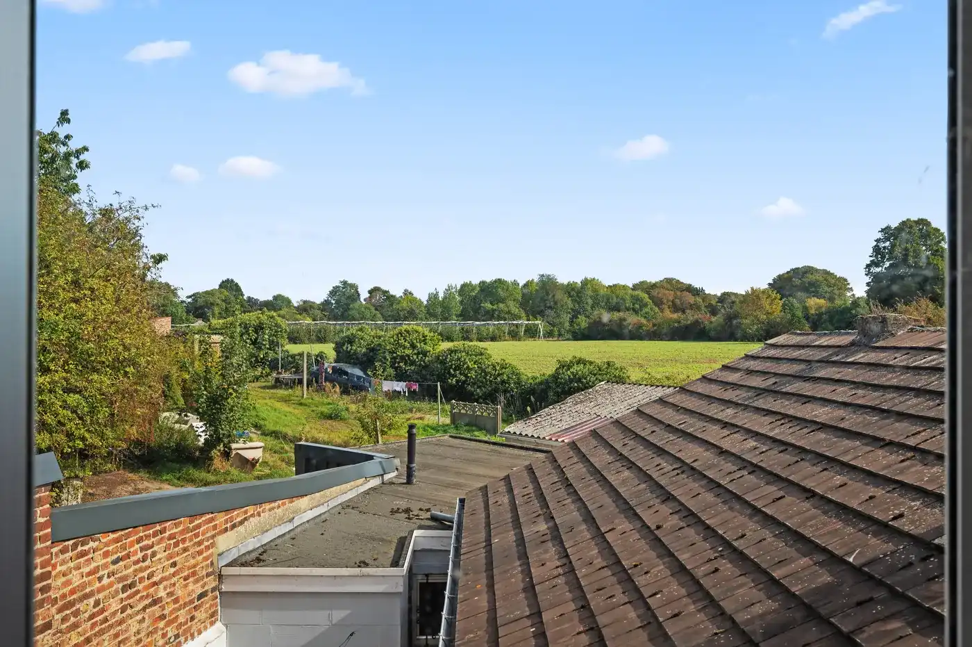 Te renoveren woning met 3 slaapkamers, garage en nabij voorzieningen foto 19
