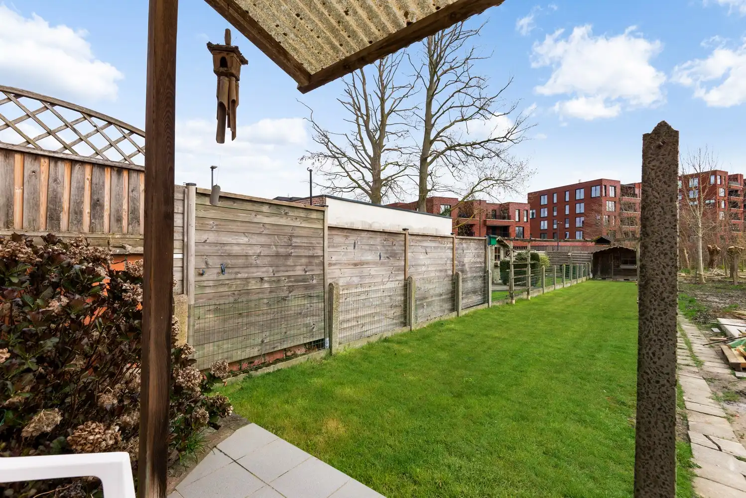 Te renoveren woning met 3 slaapkamers, veel potentieel en een groene tuin in Lier! foto 3