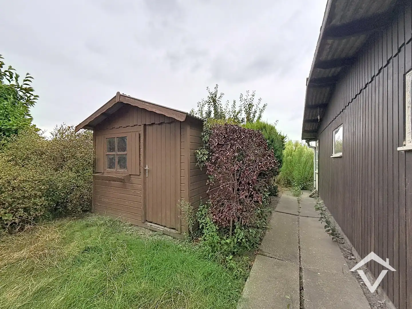 Alleenstaande woning met twee slaapkamers, tuin en garage te Roeselare foto 23