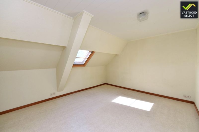 Vastgoed Select: Halfopen bebouwing met zonnige tuin, garage en renovatiepotentieel in Eeklo foto 10