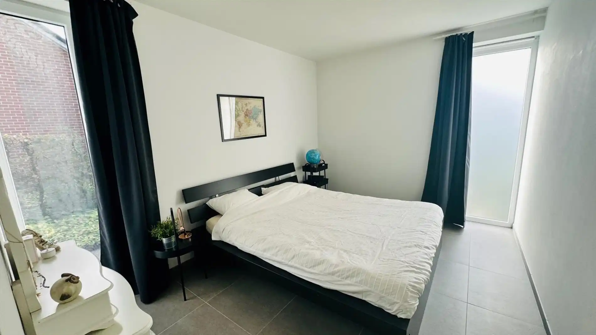 Gelijkvloers appartement met zonnepanelen - tuin - garage foto 8