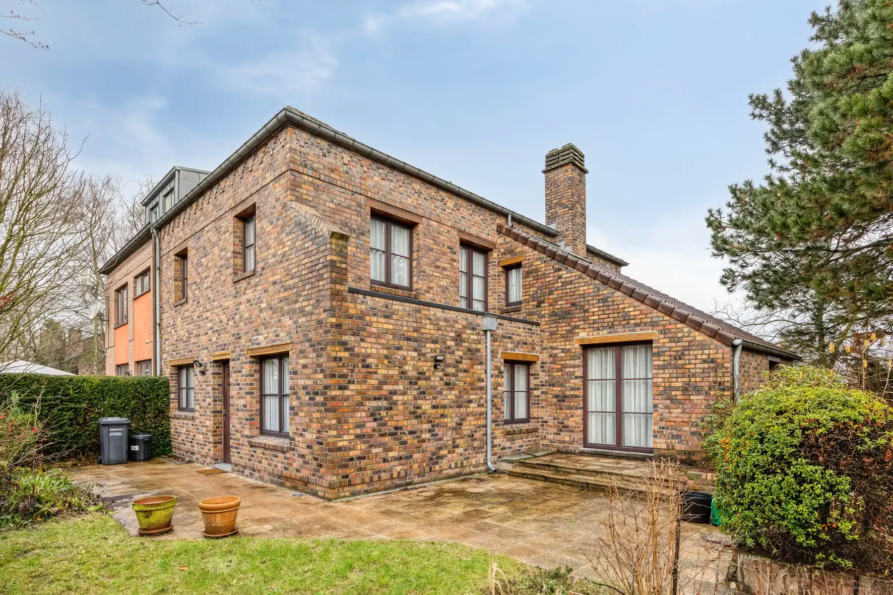 Cosy gezinswoning met 4 slaapkamers, garage en tuin - NATO op 10 min. foto 2