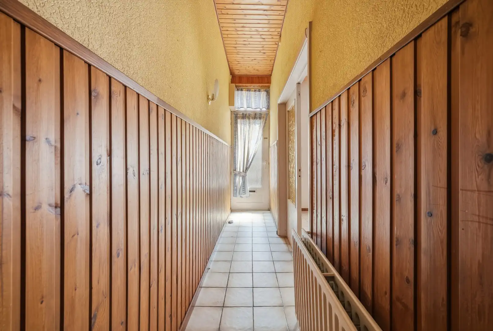 Te renoveren rijwoning in Attenhoven met tuin, garage en 3 slaapkamers foto 4