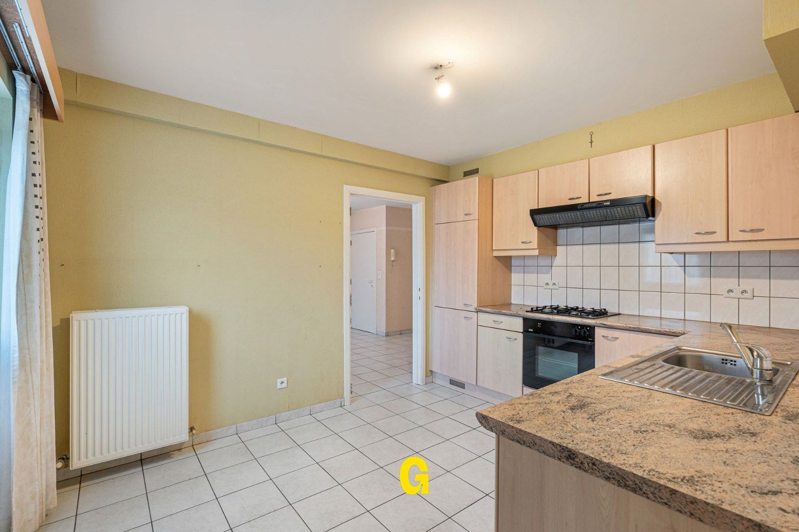 Degelijk (rolstoelvriendelijk) gelijkvoersappartement met terras uitgevend op de tuin, afsluitbare garage en berging foto 12