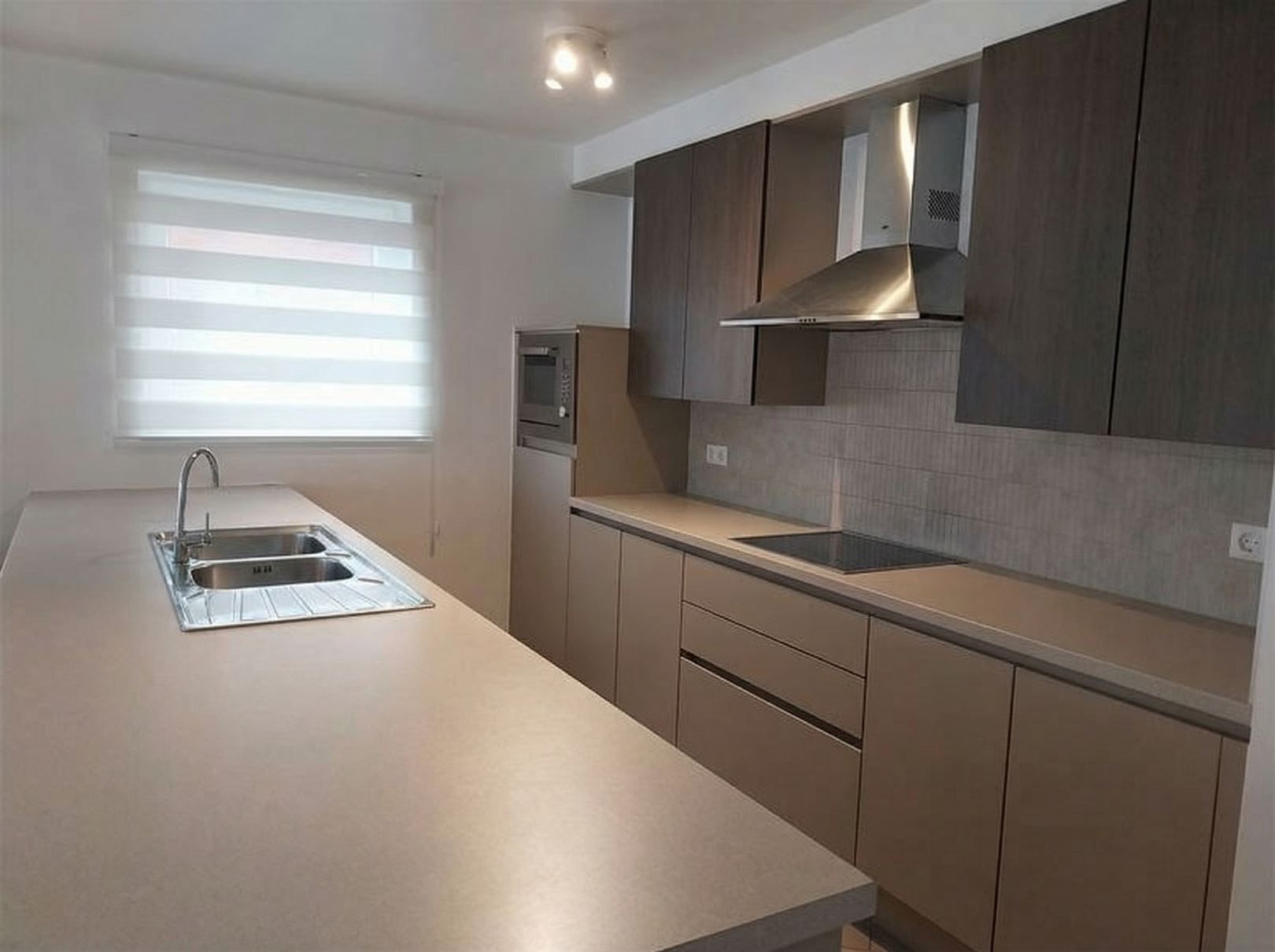 TE HUUR: Gelijkvloers appartement met 1 slaapkamer in Heusden-Zolder! foto 4