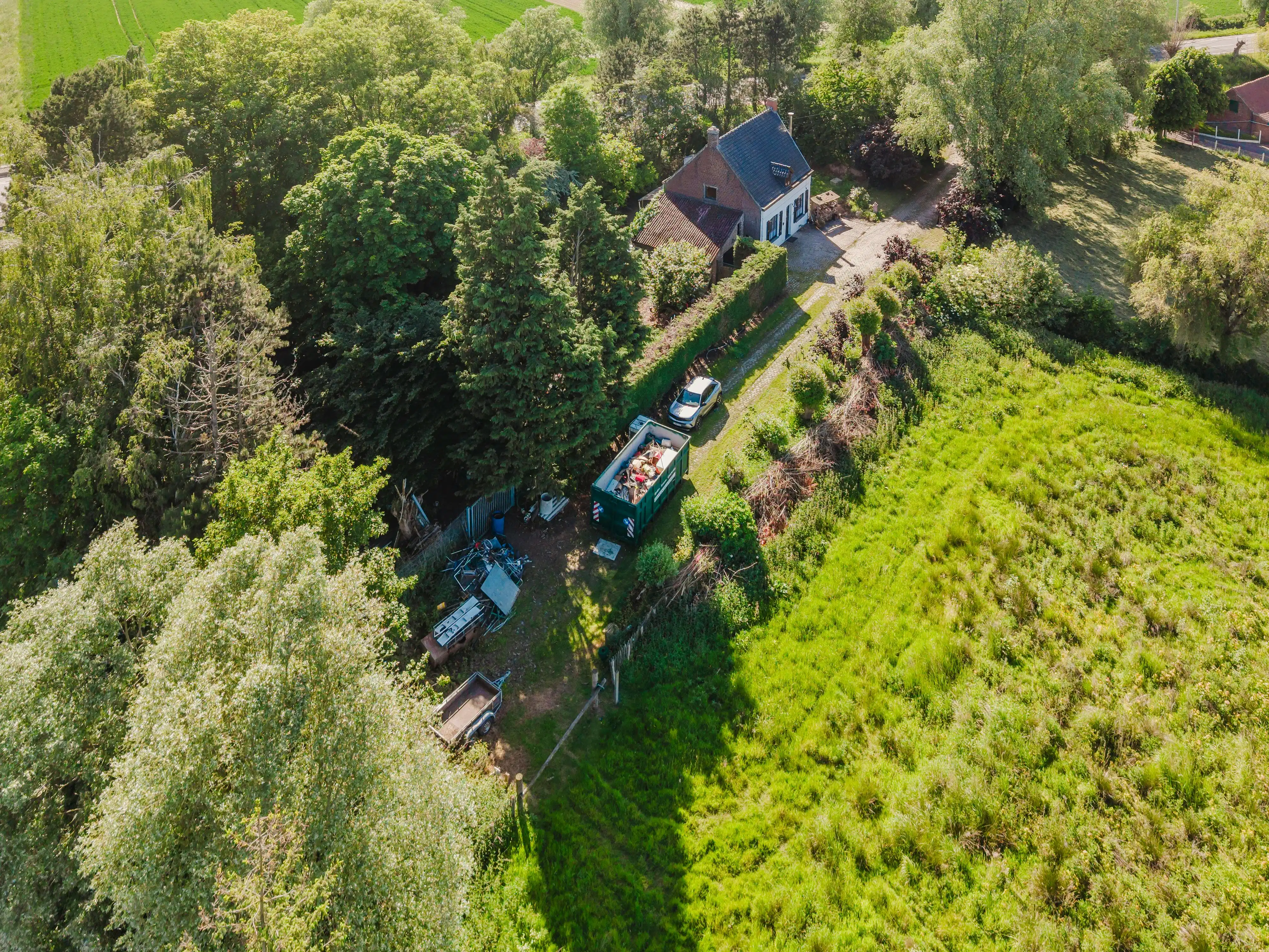 Hoofdfoto van de publicatie: Woning met renovatiepotentieel nabij Kortrijk en Preshoekbos