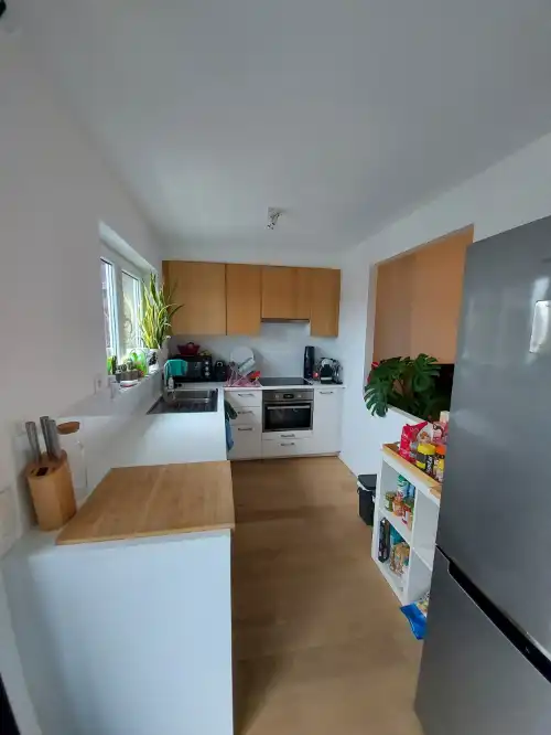 Lichtrijk en energiezuinig 2-slaapkamerappartement met lift, terras en kelderruimte foto {{pictureIndex}}