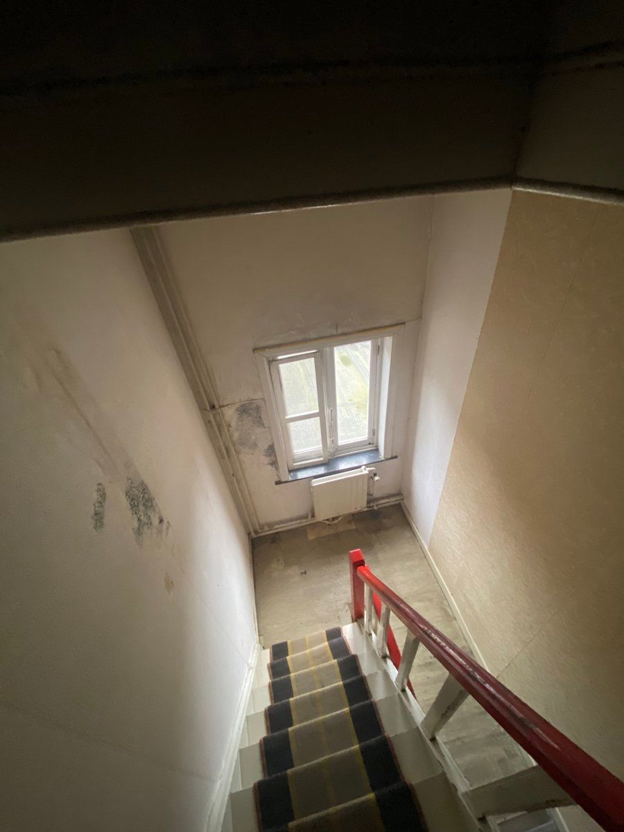 Zeer goed gelegen te renoveren woning foto 12