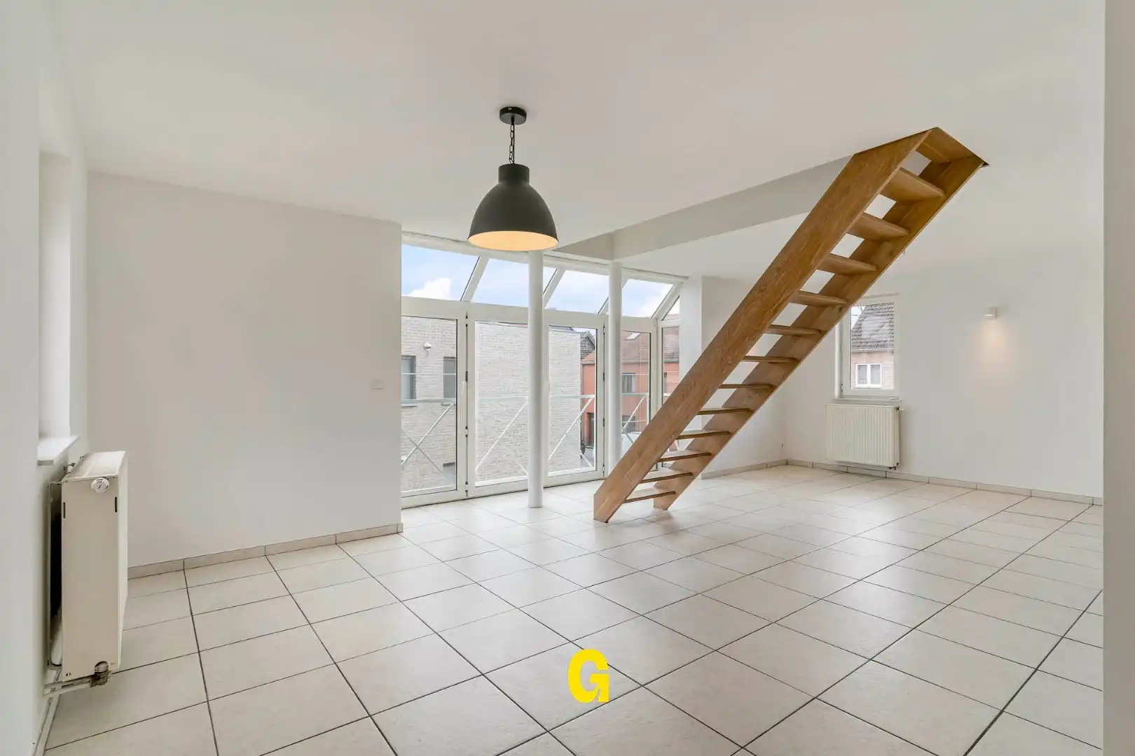 *** VERKOCHT *** Aangenaam duplexappartement met drie slaapkamers, autostandplaats en kelderberging foto 11