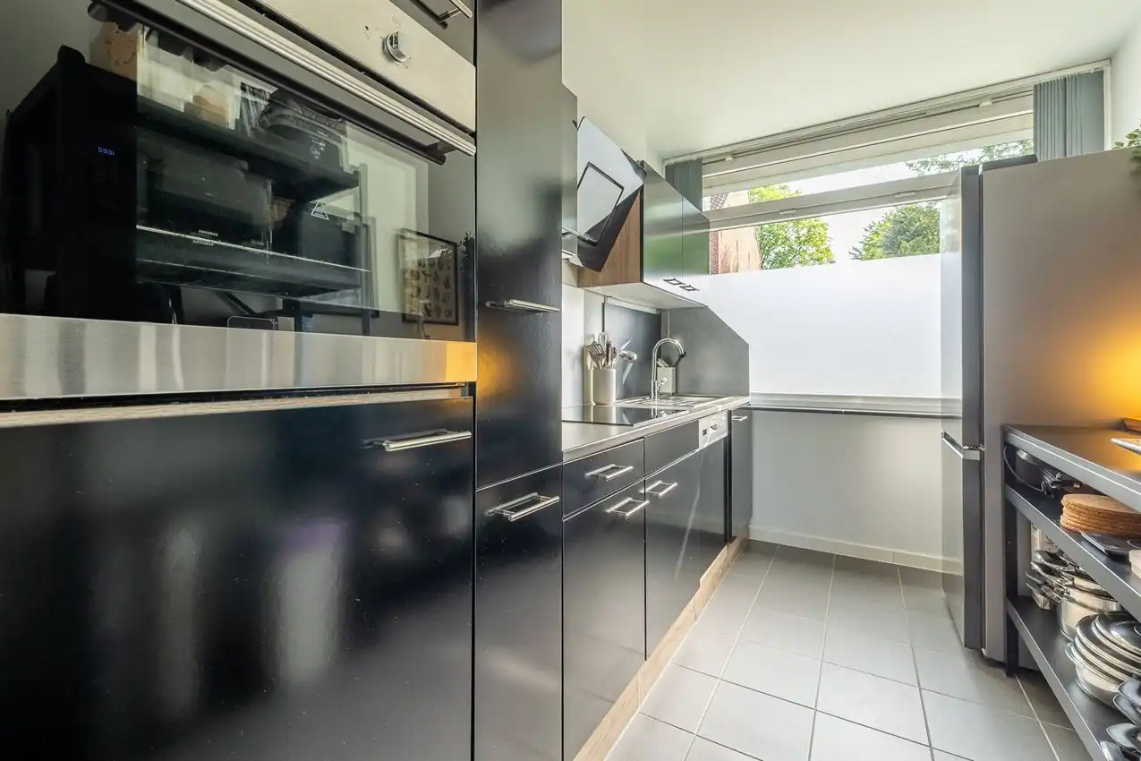 Gunstig gelegen woning, gelijkvloers, 2 slpk, omheinde tuin, garage foto 12