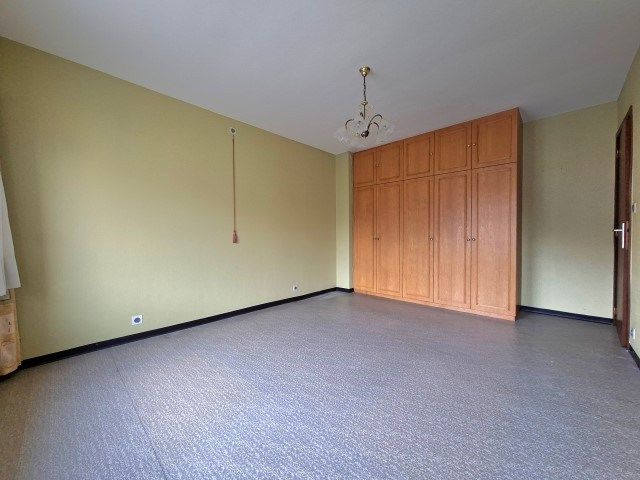 Ruime rijwoning met garage en tuin foto 10