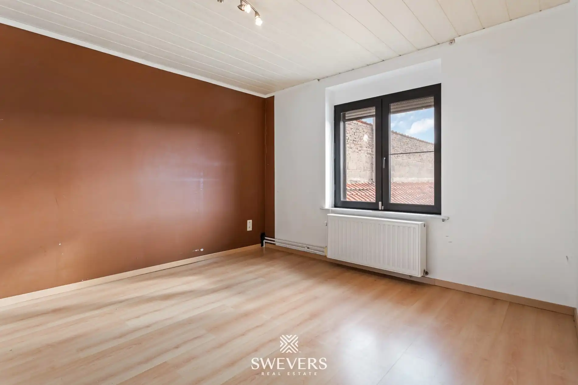 Ideale gezinswoning, instapklaar met ruime tuin en bouwgrond foto 16