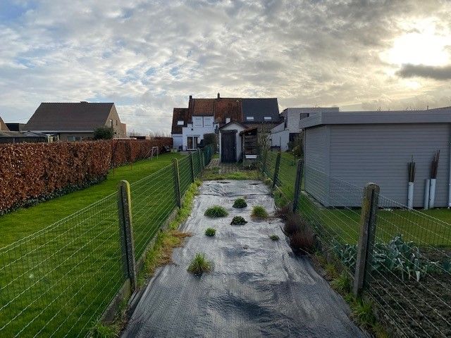 Te renoveren woning met 3 slaapkamers  en tuin. foto 8