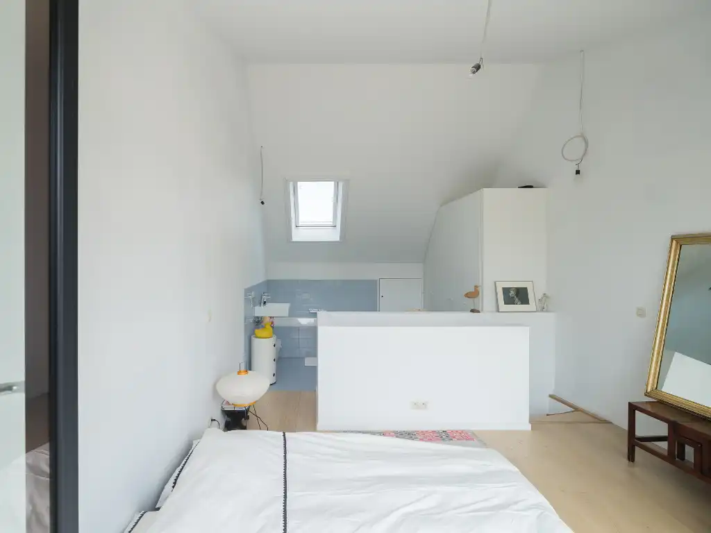 Architecturale gezinswoning met drie slaapkamers, zicht op water en groen, vlak bij de Coupure. foto 13