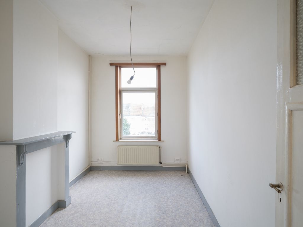 Te renoveren woning met atelier/loods, ruime tuin en bijzonder veel potentieel op een boogscheut van het stadscentrum. foto 15