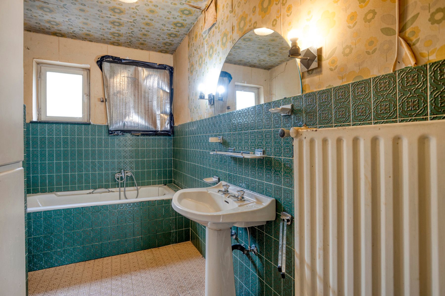 Te renoveren woning met 3 slaapkamers en tuin. foto 15