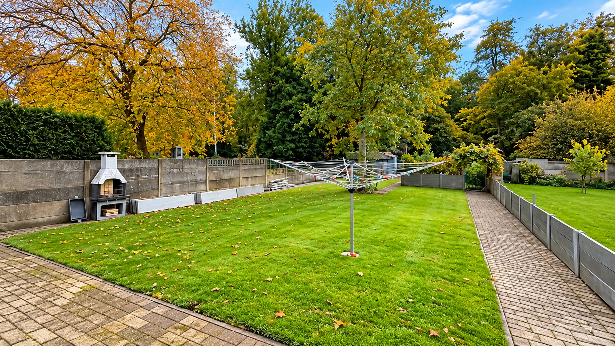 Instapklare halfopen bebouwing met zonnige tuin en garagebox foto 41