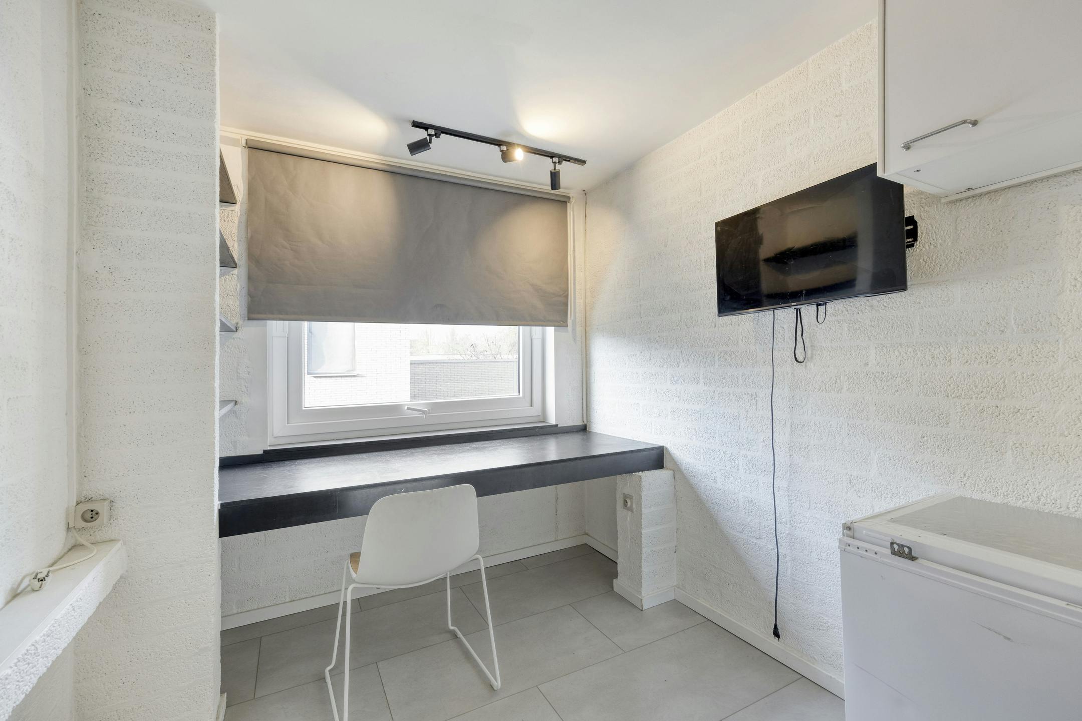 Opbrengsteigendom met 9 studentenkamers en duplex-appartement te Hasselt foto 7