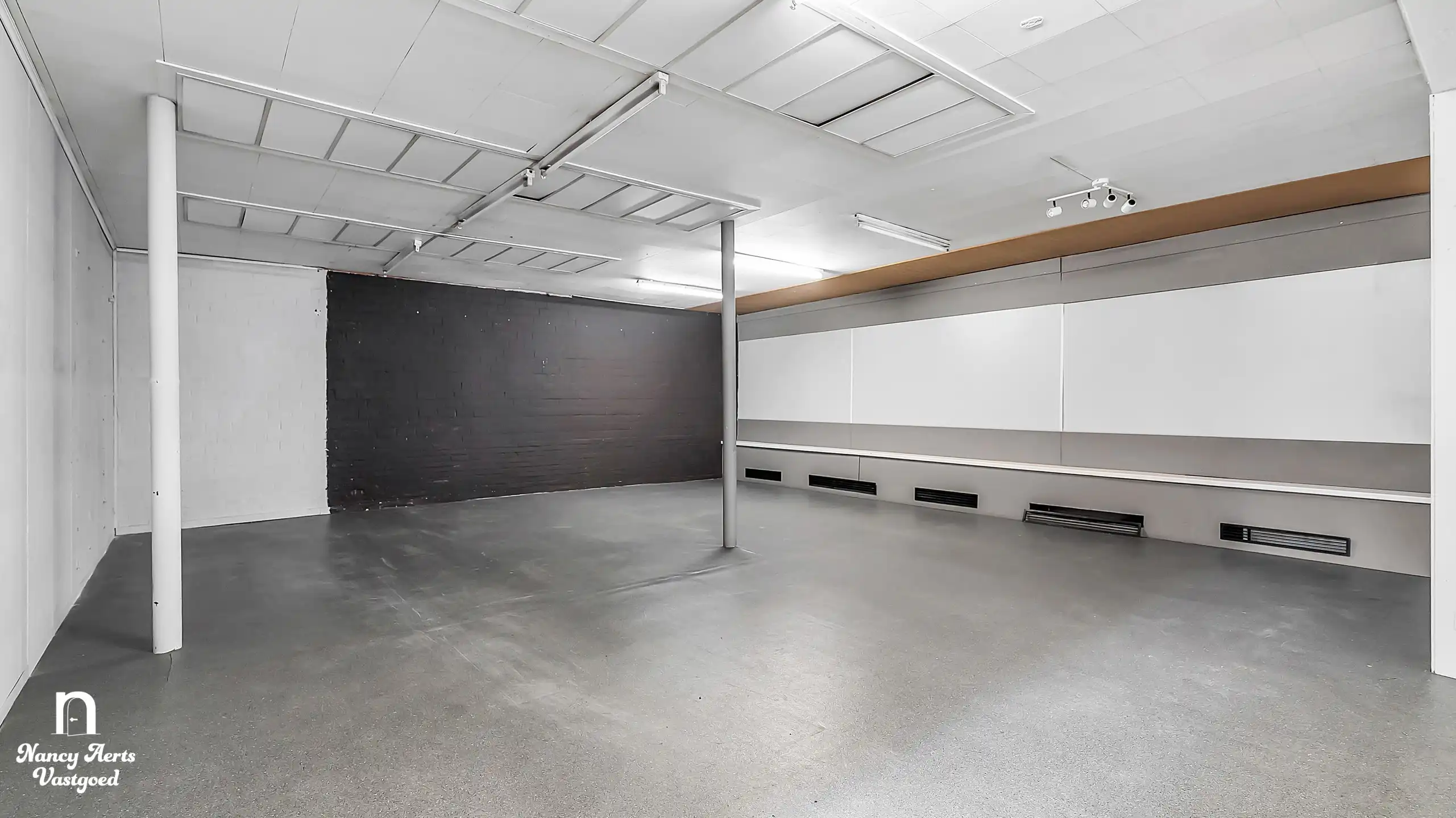 Handelspand van 395 m² in het centrum van Beringen foto 14
