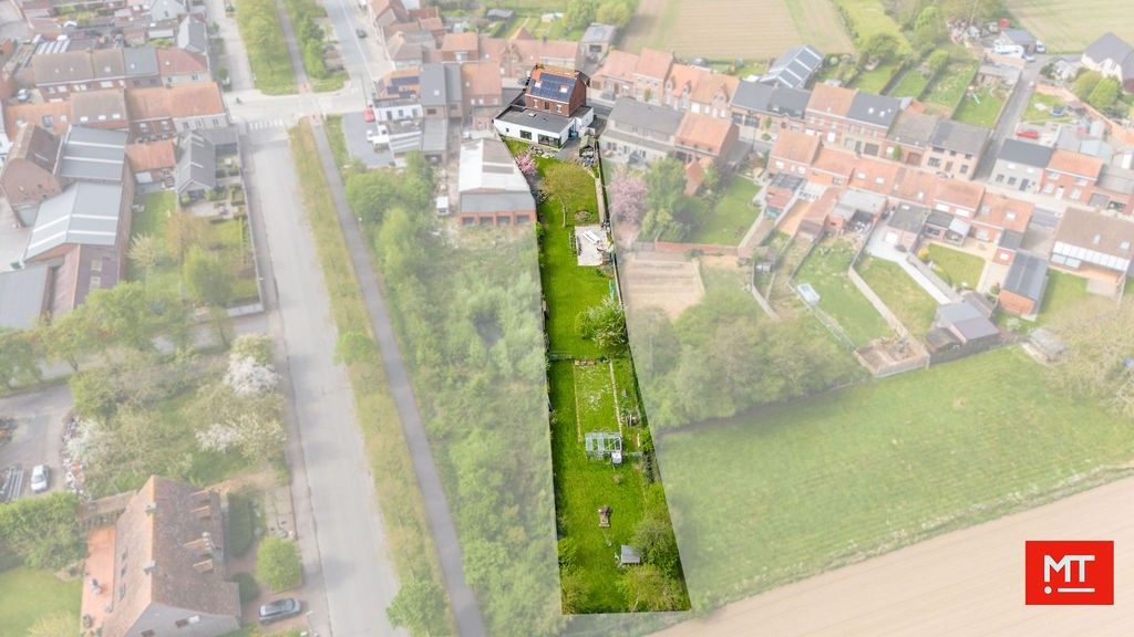 Bijzonder ruime alleenstaande woning op 1.828 m² in het centrum van Langemark foto 4