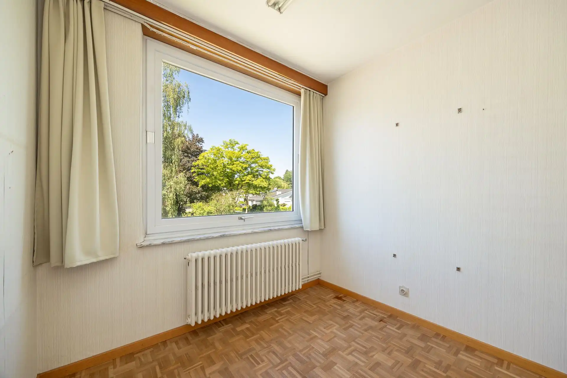 Ruime halfopen bebouwing met garage en zonnige tuin foto 21