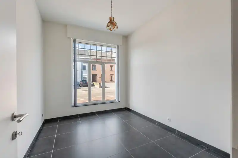 Gelijkvloers appartement met 2 slaapkamers, autostaanplaats en terras foto 11