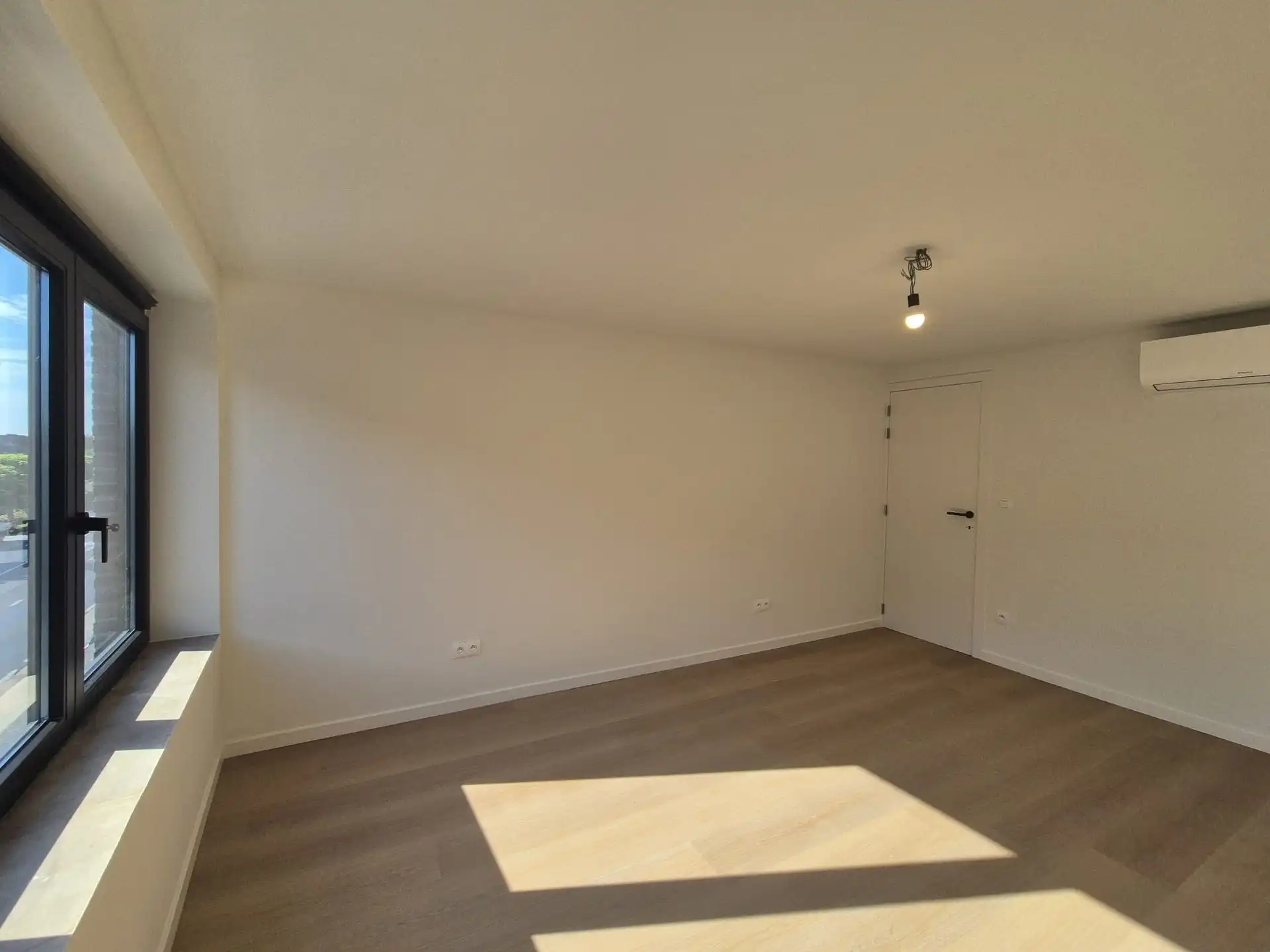 Ruim triplex appartement met polyvalente ruimte op toplocatie in het hart van Wetteren foto 15