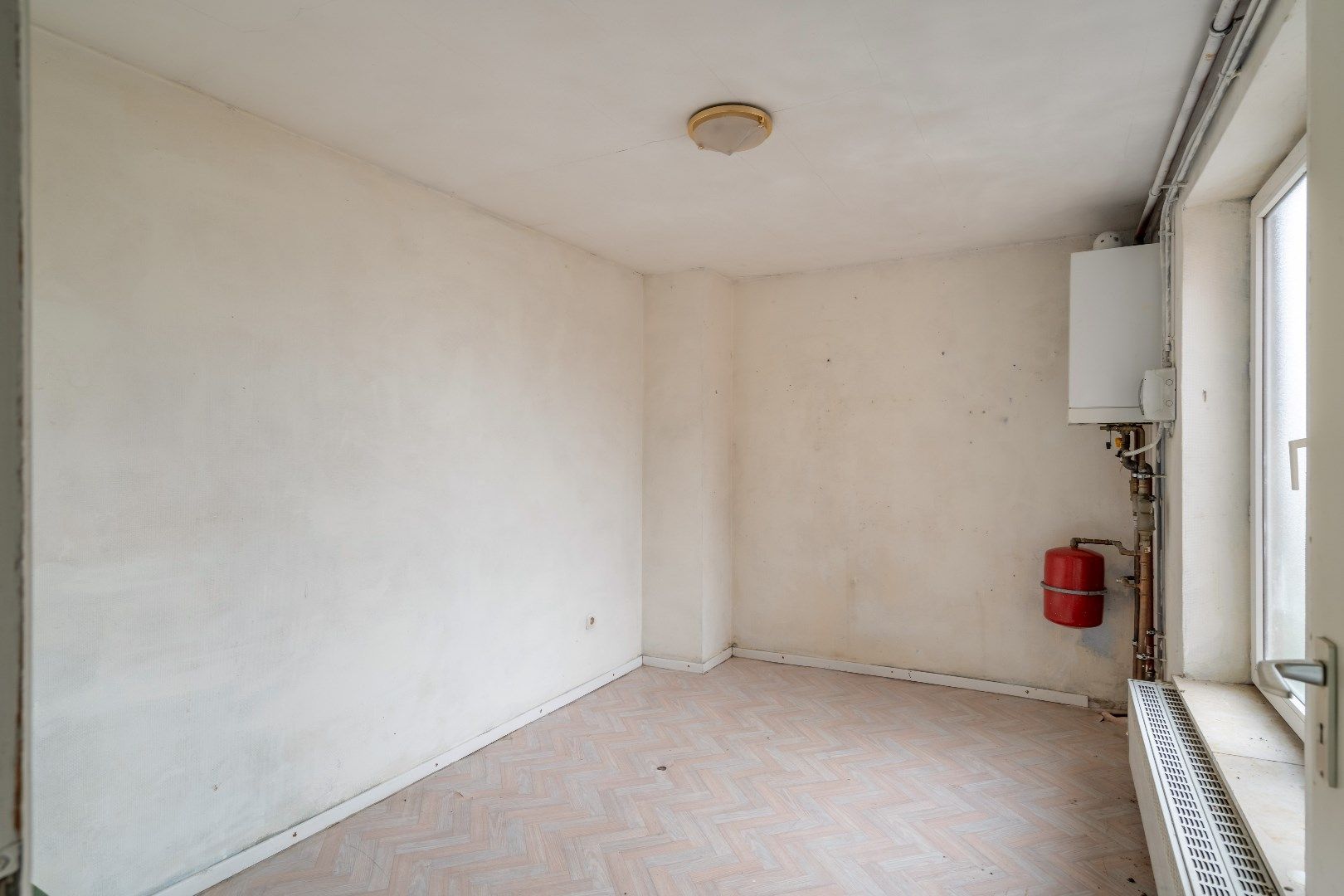 Te renoveren appartementsgebouw bestaande uit drie appartementen en een studio, vlakbij het centrum van Hoeselt foto 25