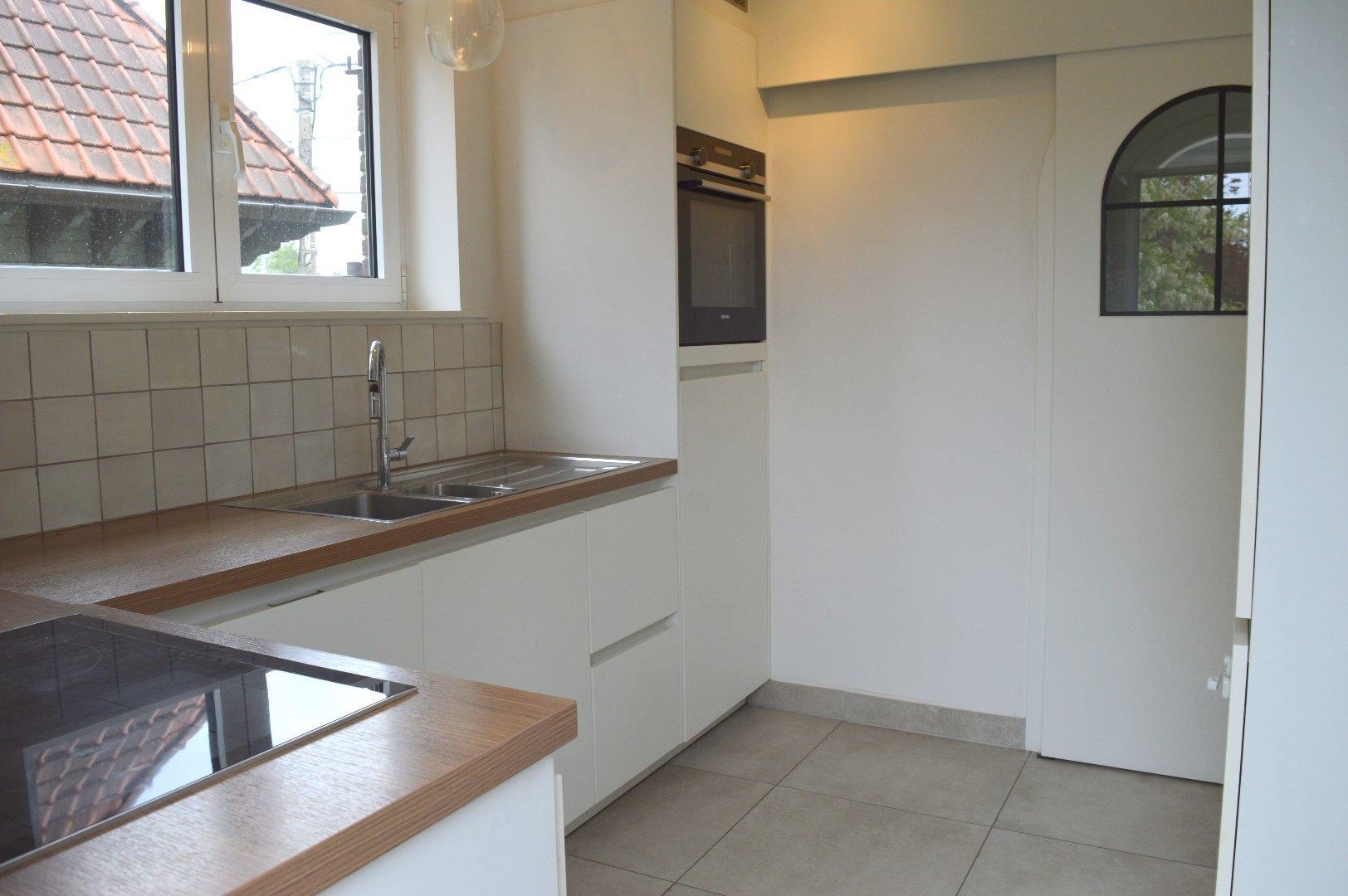 Ruime woning met garage, tuin en 3 slaapkamers in Kortrijk foto 8