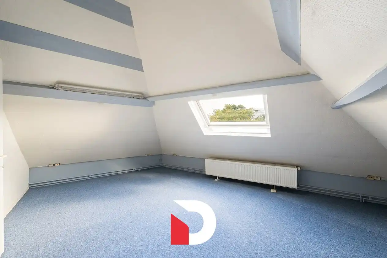 Lichtrijke hoekwoning uitgerust met een polyvalente ruimte / atelierruimte op de gelijkvloerse verdieping. foto 8