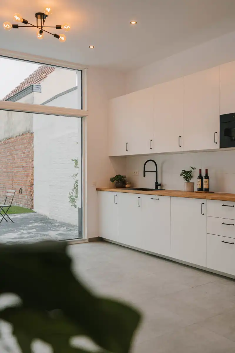 Vernieuwde energiezuinige woning in centrum Tremelo foto 13