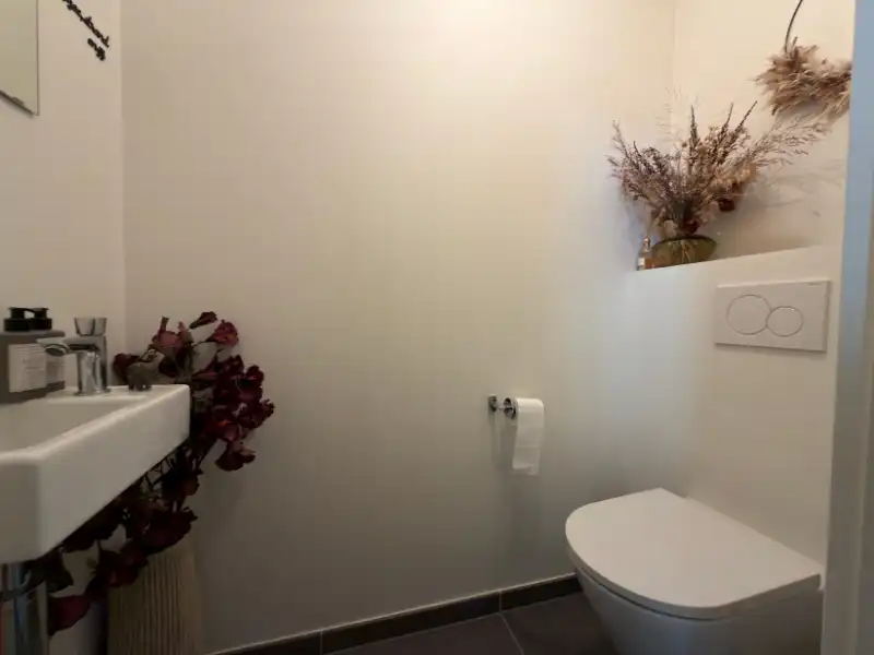 Energiezuinige woning met tijdloze architectuur in het charmante Oostduinkerke dorp! foto 19
