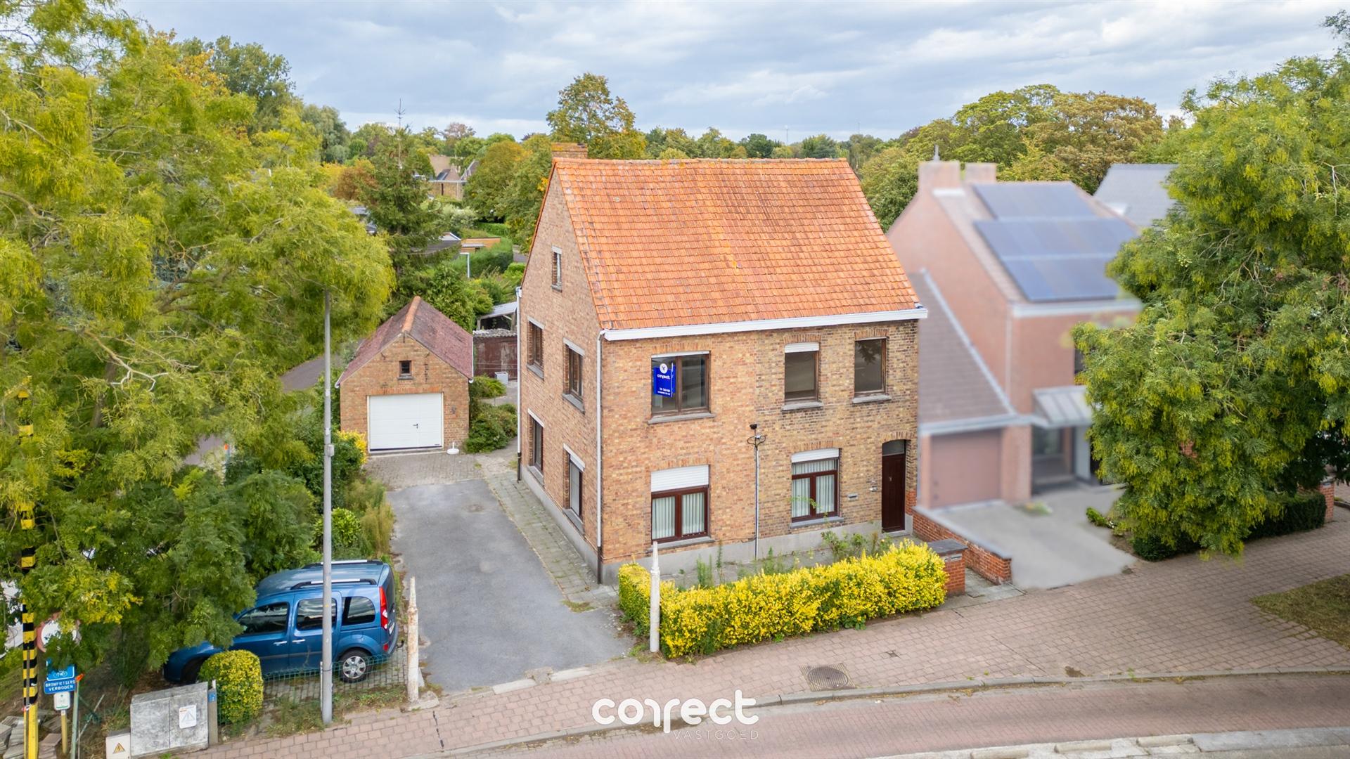 Grond met af te breken woning in centrum Sint-Michiels foto 2