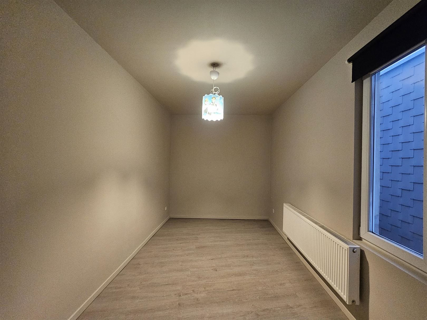 Gunstig gelegen ruime woning met stadskoer. foto 8