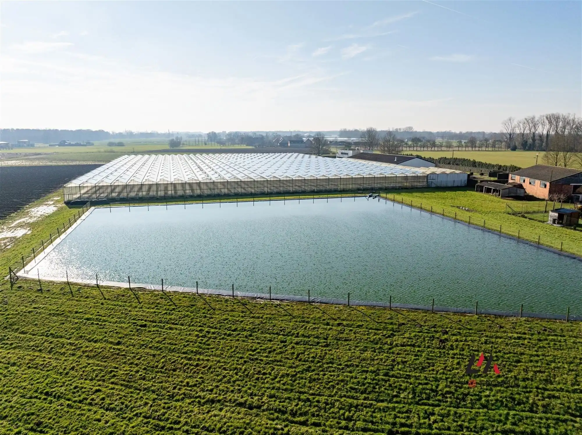 Moderne landbouwwoning met serre en loods op 10 ha foto 30