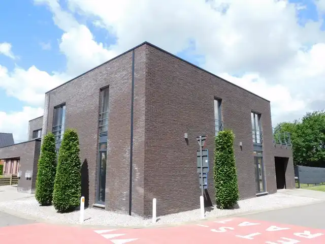 Rustig gelegen, energiezuinig appartement met carport foto 18