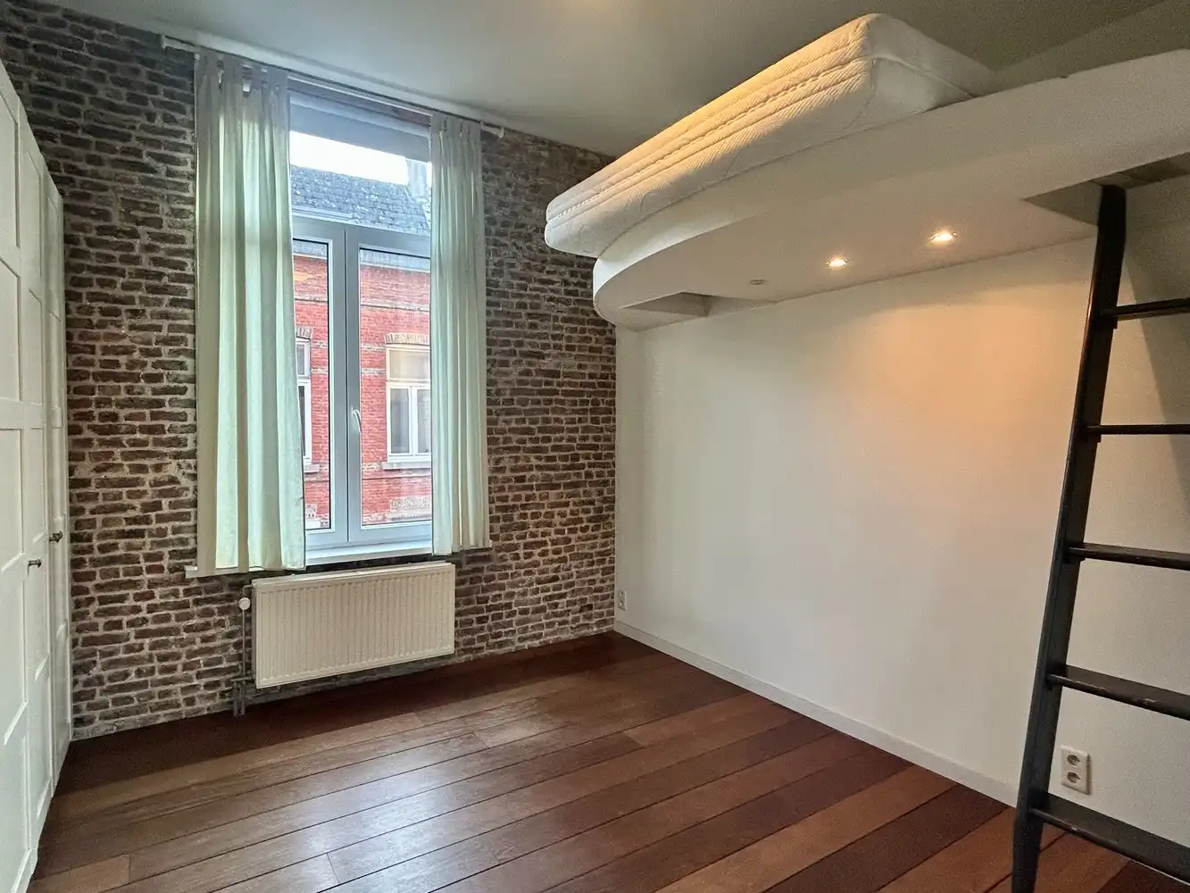 Gezellige rijwoning met prachtige stadstuin en achteruitgang nabij centrum Leuven foto 10