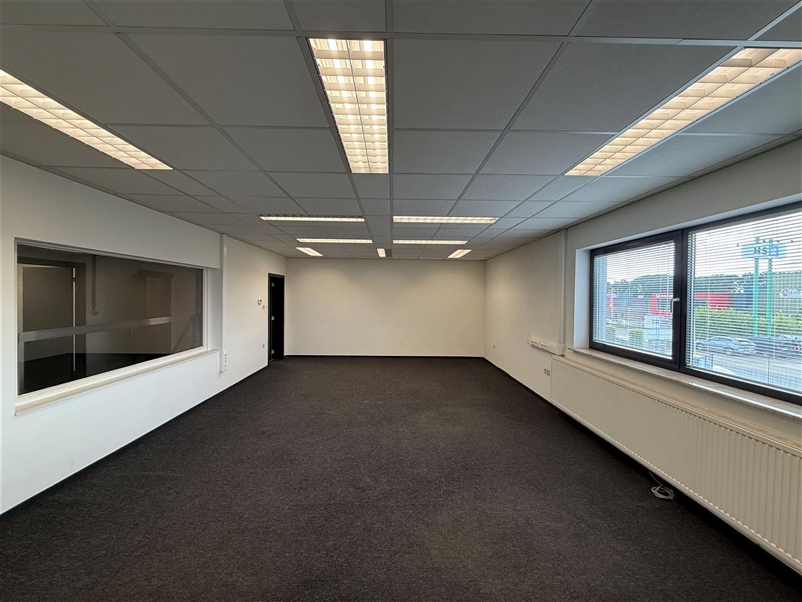 Instaplaar Magazijn met ingebouw kantoor te Lummen foto 7