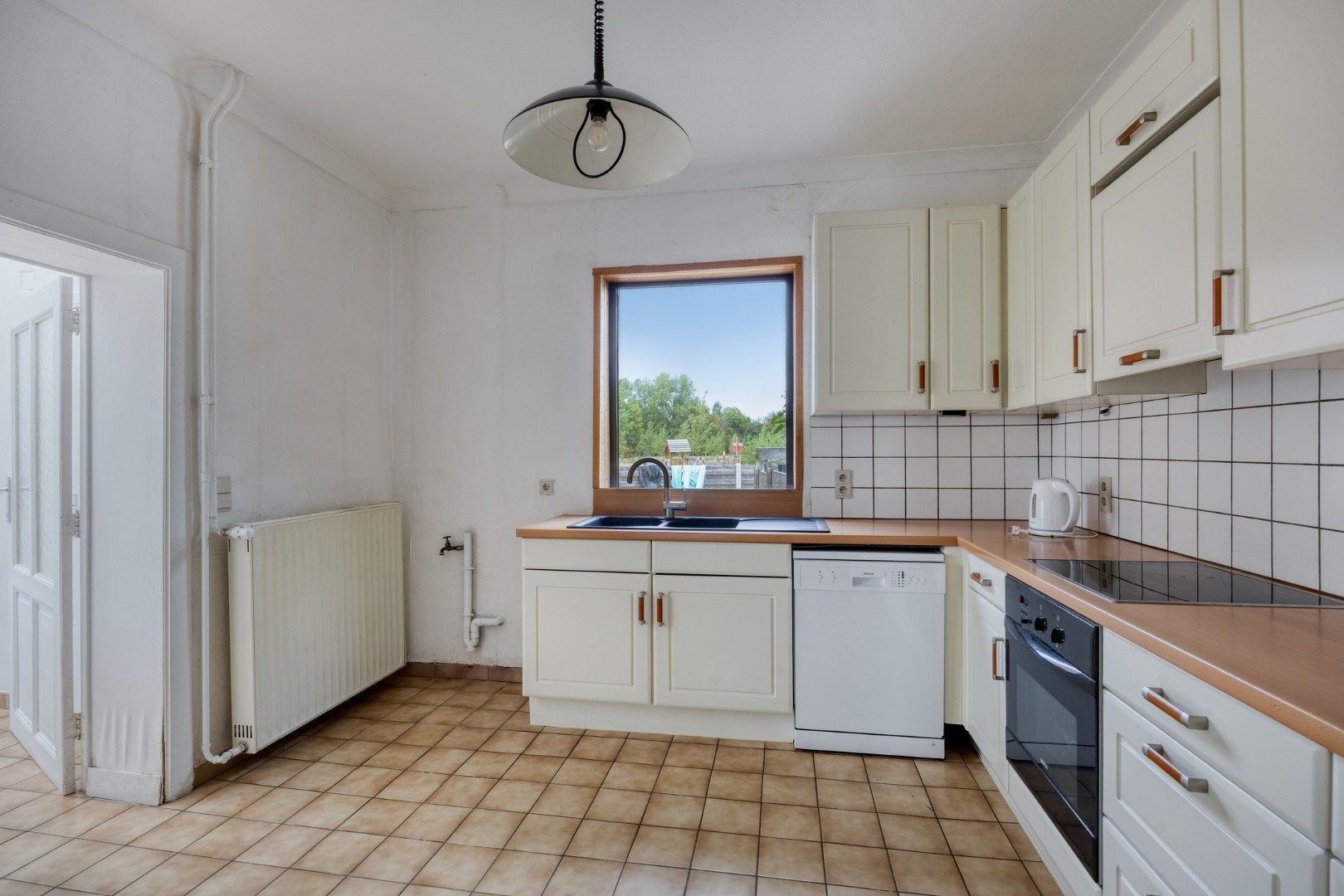 Woning met veel woonoppervlakte, zolder, garage en tuin te Tongeren-Lauw foto 12