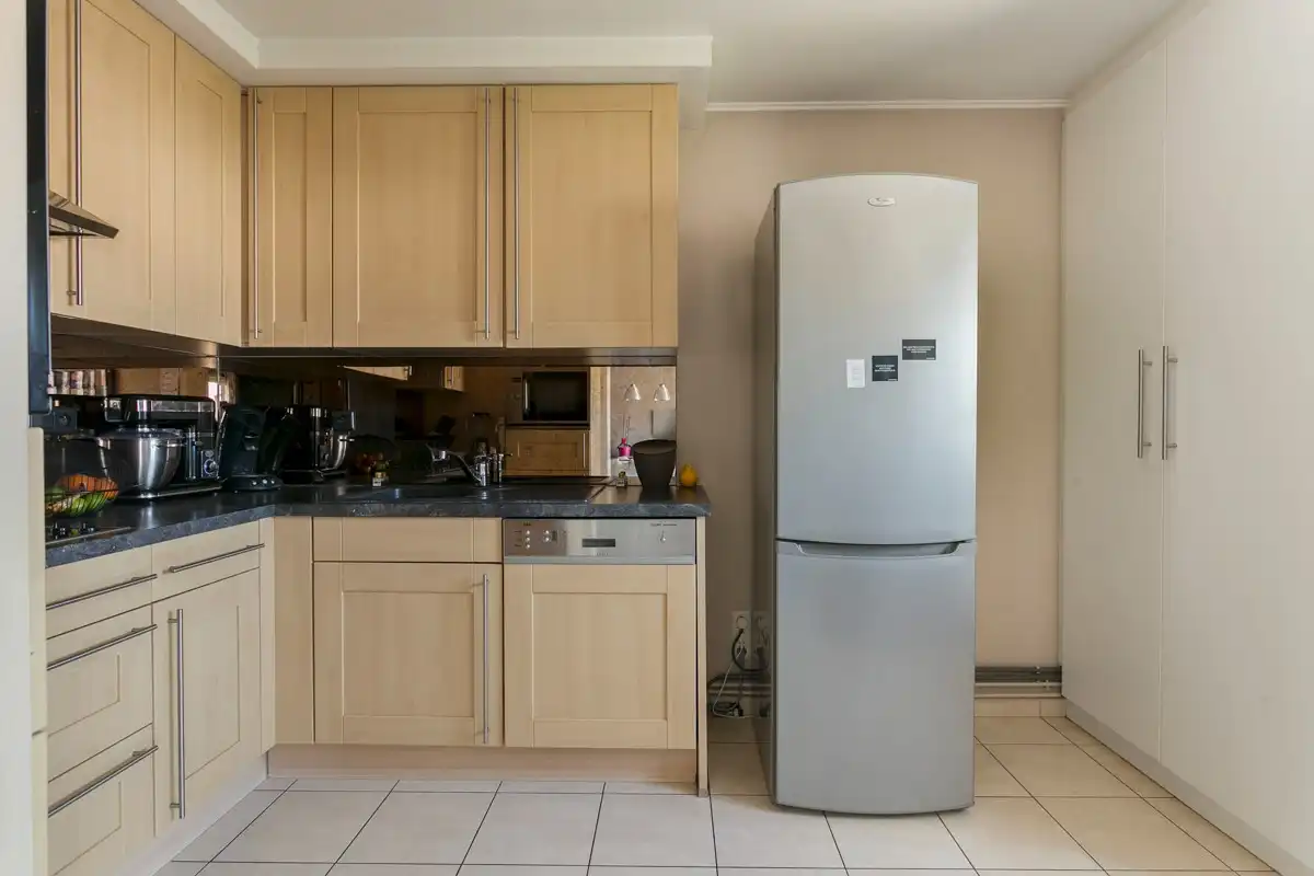 Appartement met twee slaapkamers en autostaanplaats in de ondergrondse garage in Rekem/Lanaken! foto 9