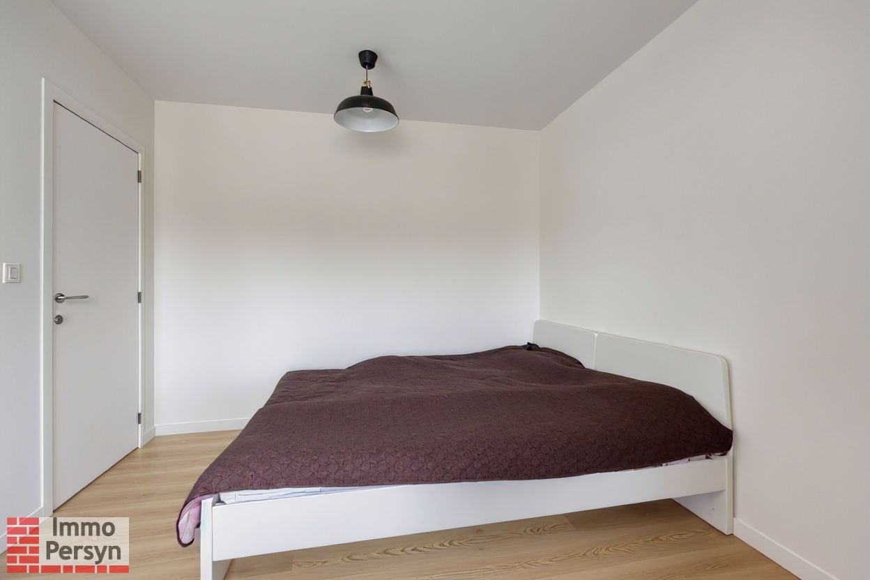 Moderne gezinswoning met 3 slaapkamers en gezellige tuin foto 17