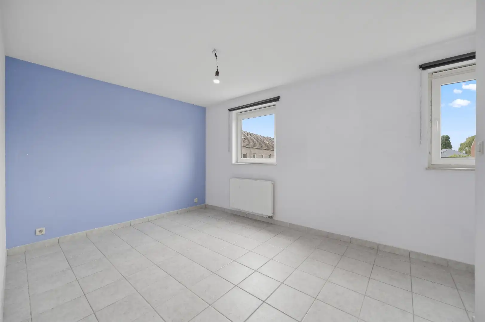 Instapklare rijwoning uit 2009 met 3 slpks, zonnig terras, tuin en 2 autostaanplaatsen foto 8