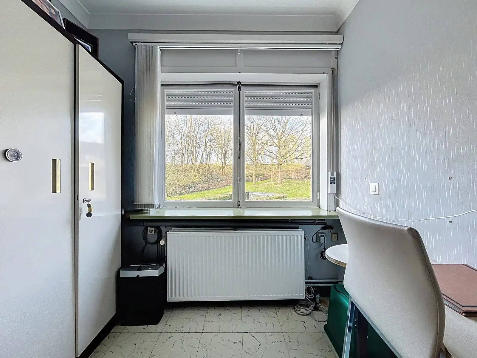 Gelijkvloerse villa met 3 slks & tuin op 7 minuten van  E40  foto 8