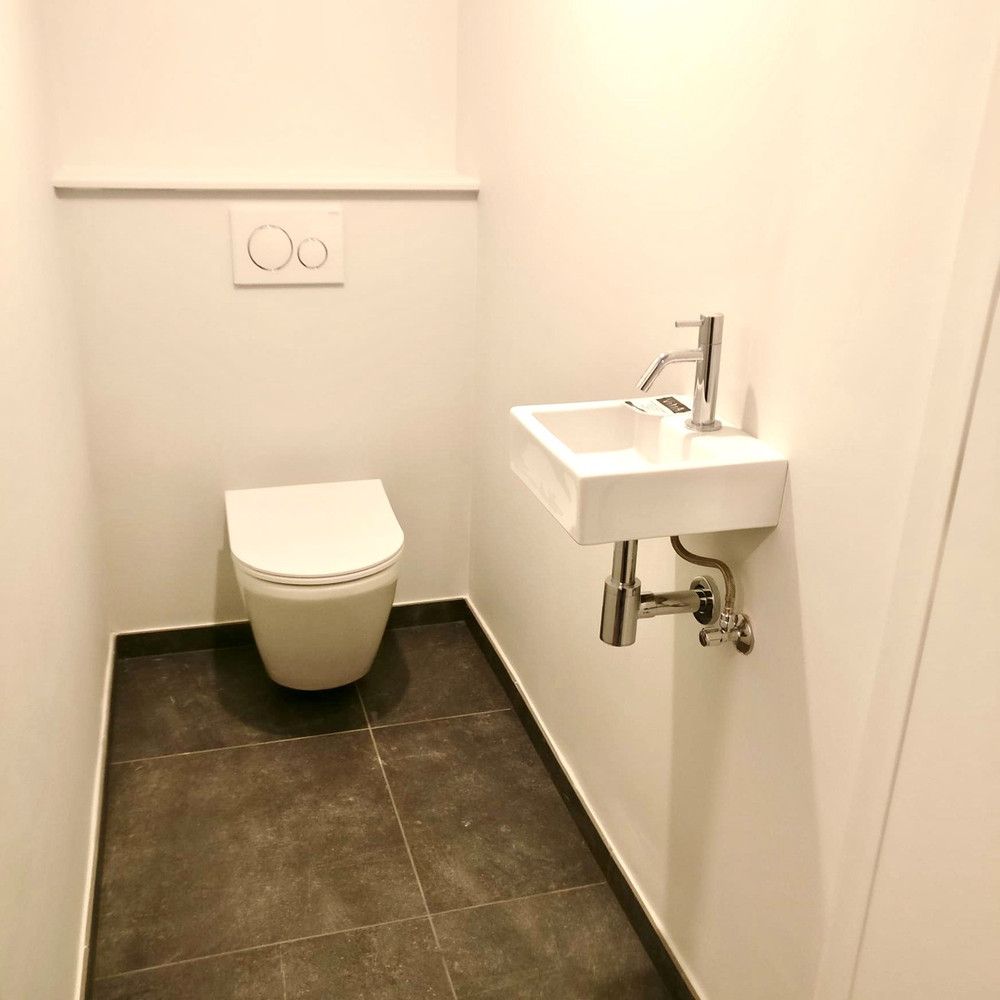 Modern gelijkvloers appartement met terras en tuintje in Opitter foto 11