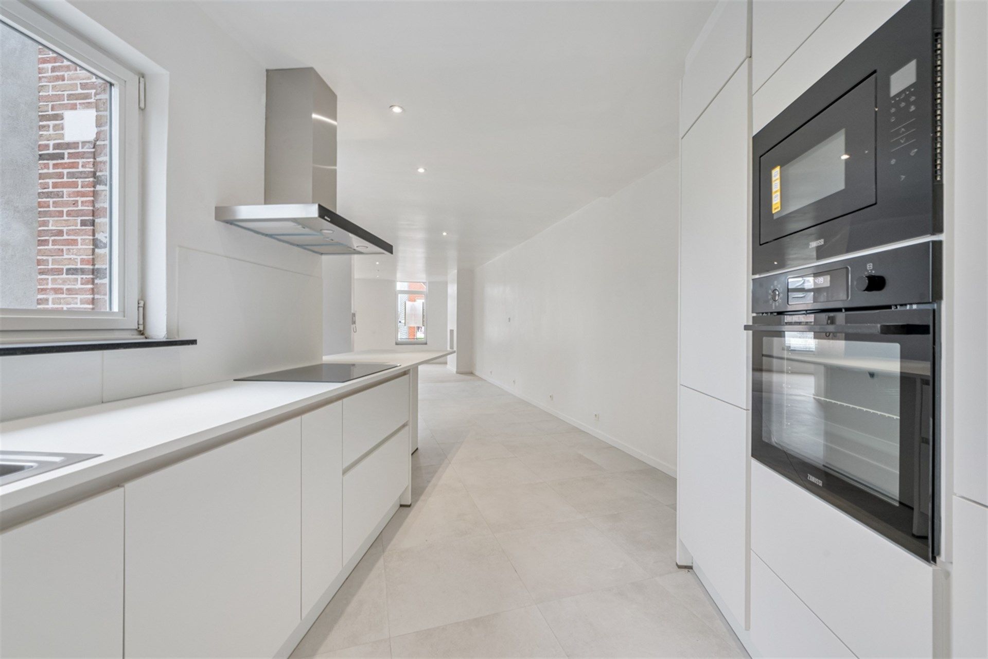 Instapklaar en volledig vernieuwd appartement met ruim terras in het hart van de stad foto 7