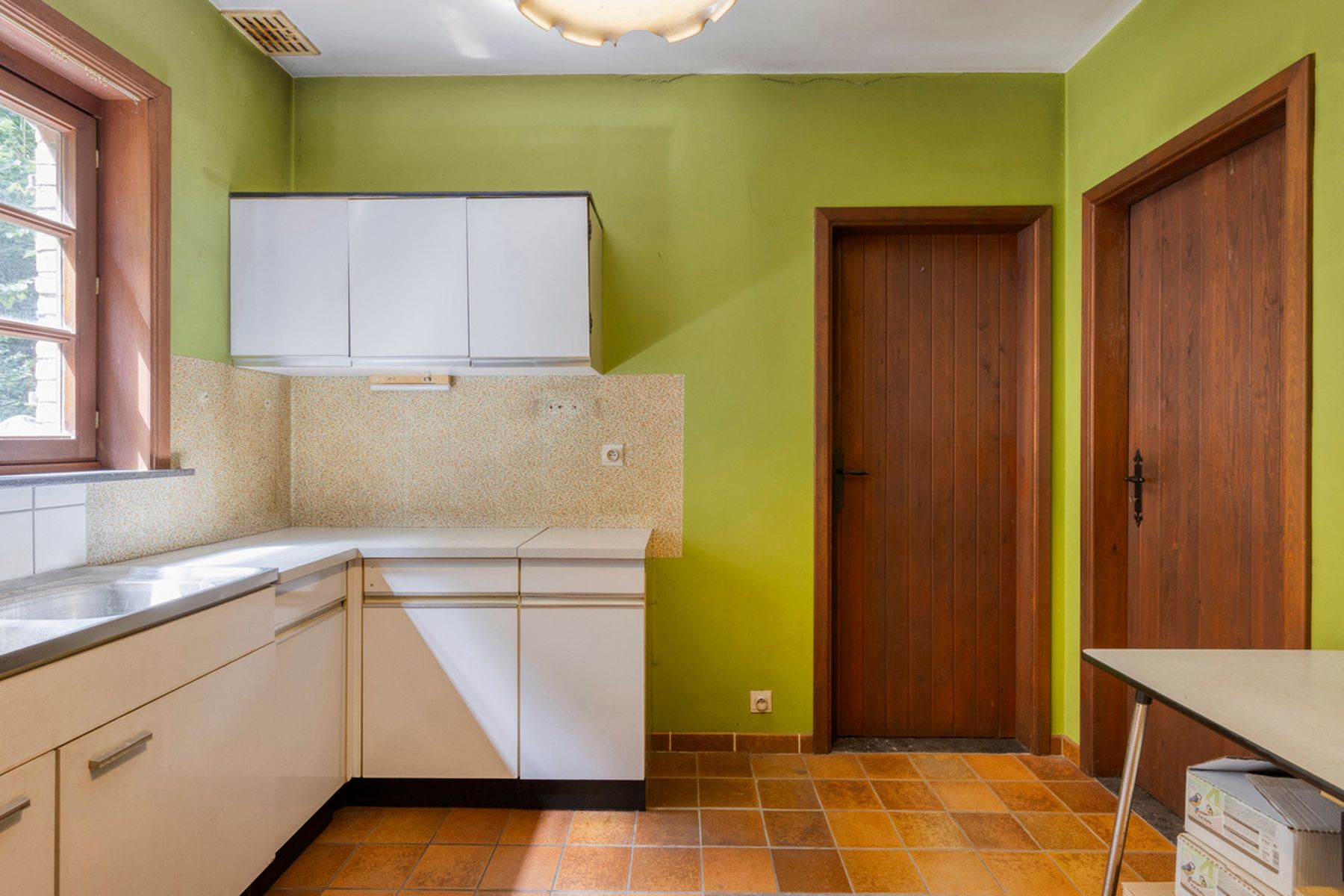 Te moderniseren rustig gelegen woning met 3/4 slaapkamers foto 11